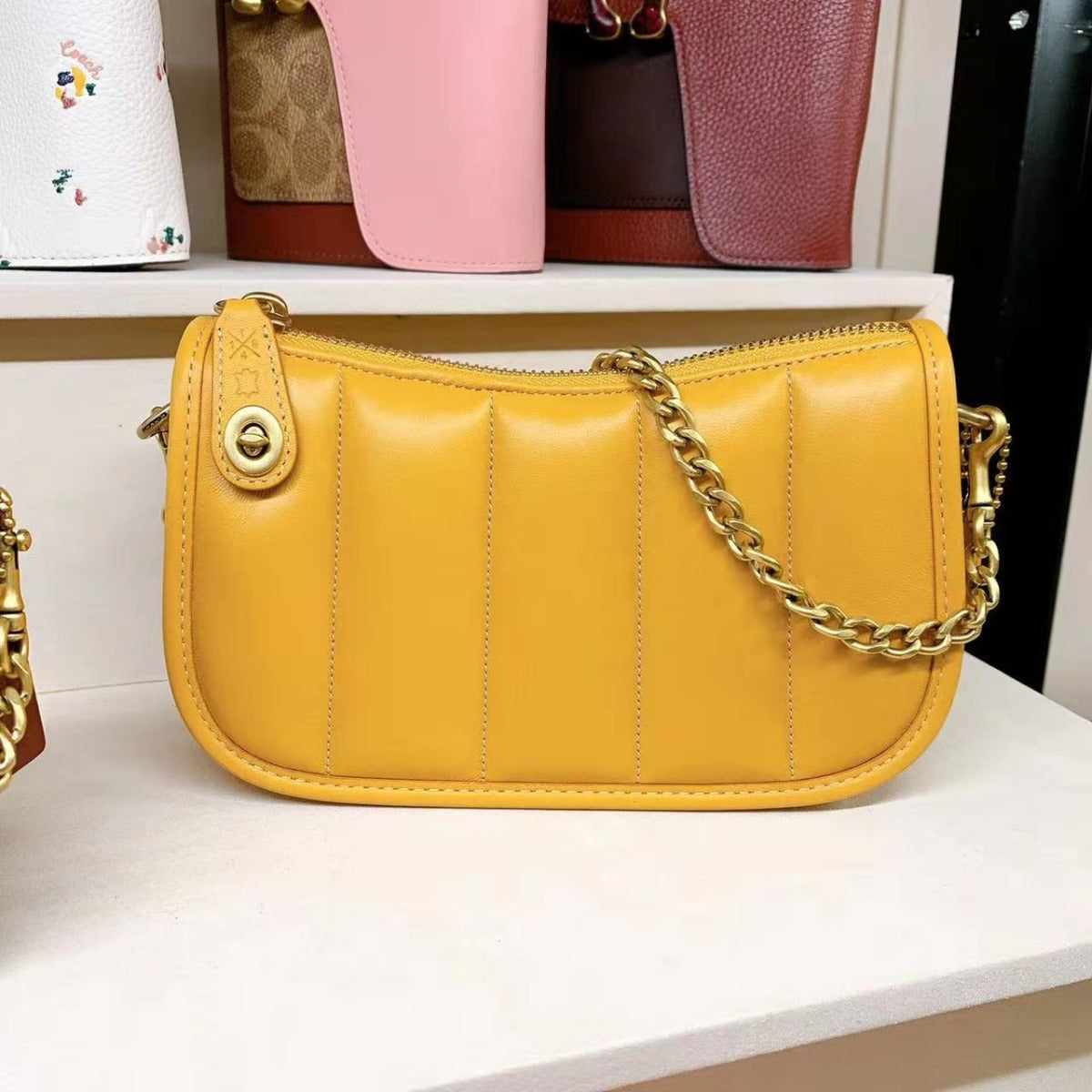Coach C3490 Swinger 20 With Quilting In Brass/Buttercup Coach C3490 Swinger 20 With Quilting In Brass/Buttercup